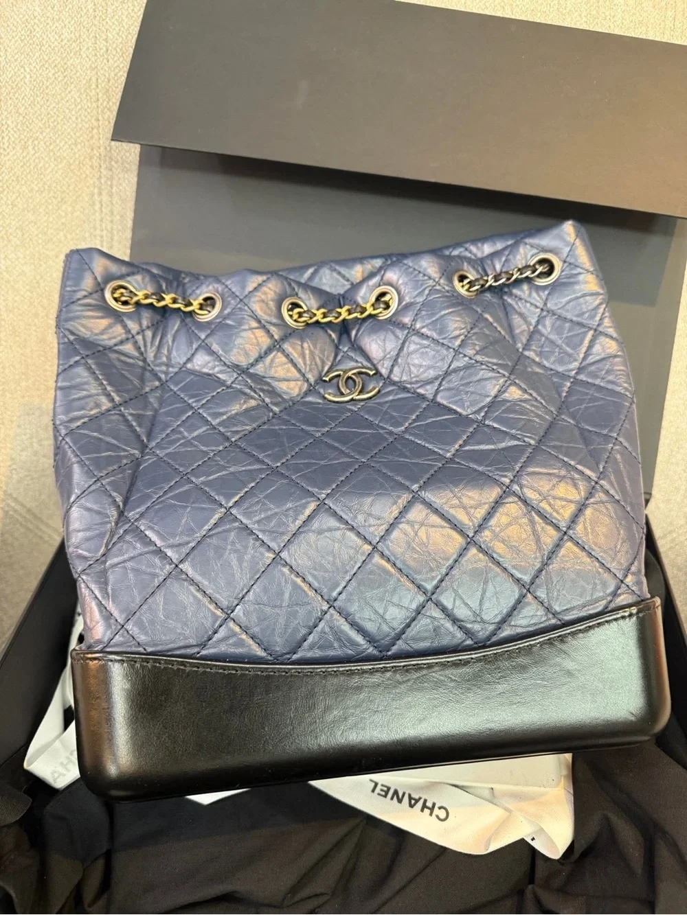 CHANEL Navy Quilted Leather Drawstring Shoulder Bag with Black Base Medium